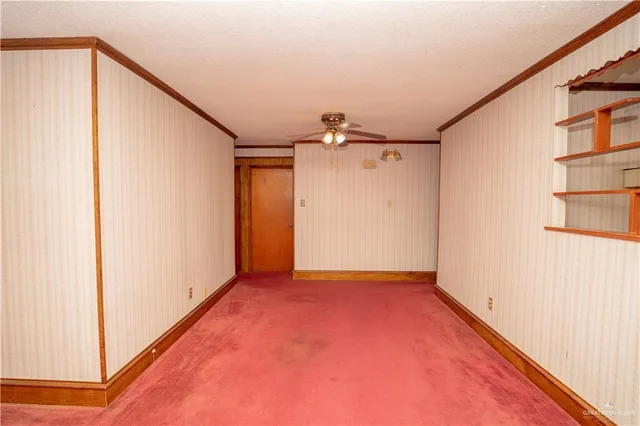 a view of a room with window and walk in closet