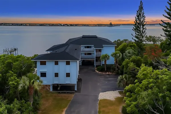 a view of a house with a ocean view