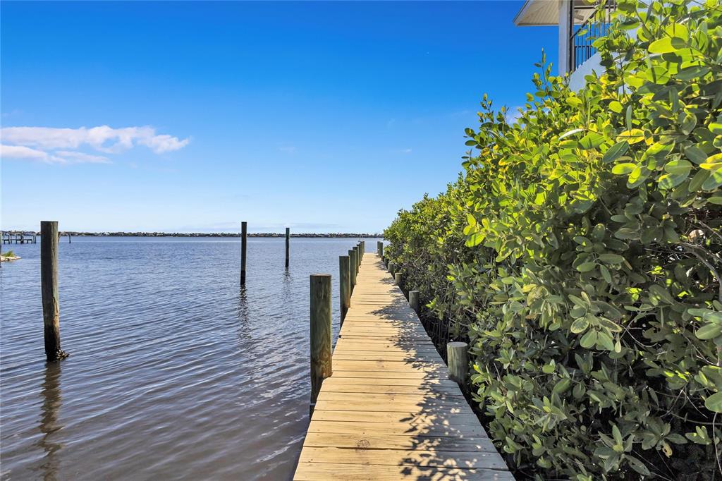 4403 7th Street East, Unit 4 Ellenton, FL 34222 - Photo 17 of 19 a view of a balcony with wooden floor and fence