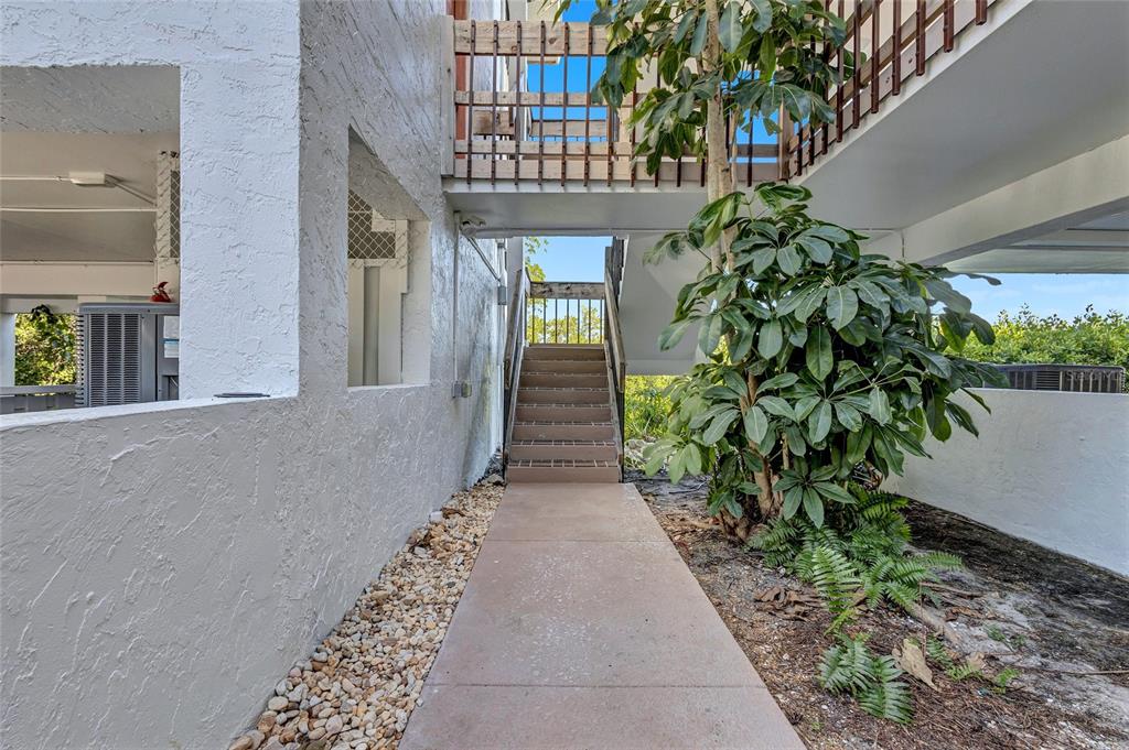4403 7th Street East, Unit 4 Ellenton, FL 34222 - Photo 23 of 25 a entryway view with a garden