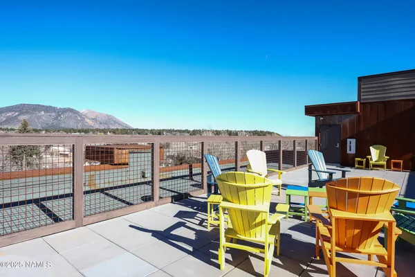 a view of a patio with swimming pool