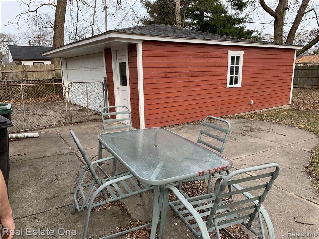 20472 Wick Road Taylor, MI 48180 - Photo 17 of 24 Head out of the backdoor into the spacious yard where the 2.5 car garage and patio greet you. Check out the concrete quality!