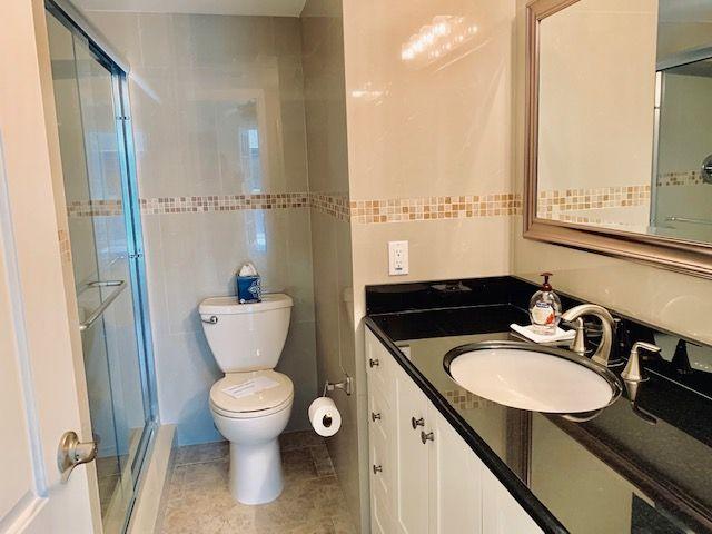 2047 Wolverton C, Unit 2047 Boca Raton, FL 33434 - Photo 13 of 30 Master Bathroom
