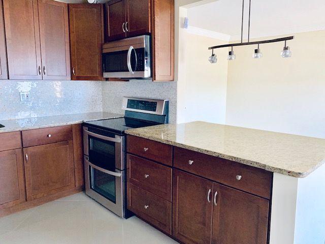 2047 Wolverton C, Unit 2047 Boca Raton, FL 33434 - Photo 6 of 30 Open Kitchen