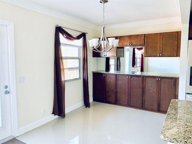 2047 Wolverton C, Unit 2047 Boca Raton, FL 33434 - Photo 9 of 30 Dining Area