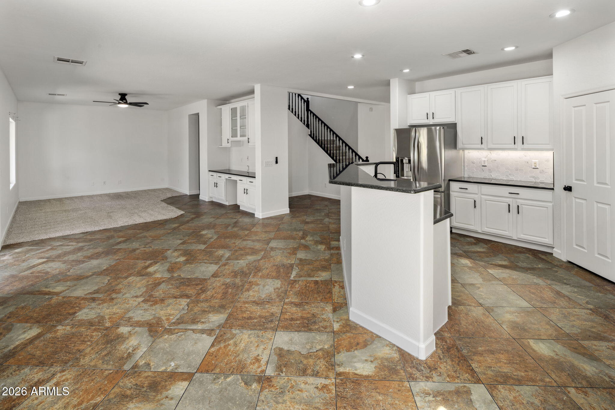 5121 West Beverly Road Laveen, AZ 85339 - Photo 21 of 32 a view of a kitchen with refrigerator and microwave