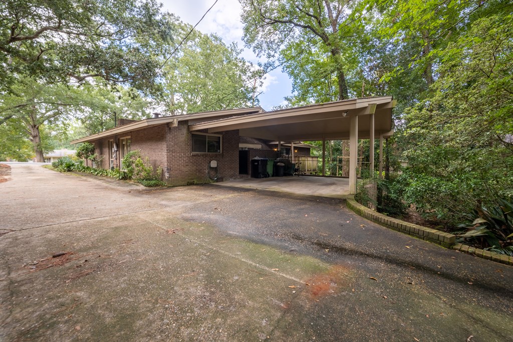 2724 Edgewood Road Columbus, GA 31906 - Photo 20 of 22 a view of a house with a yard and garage