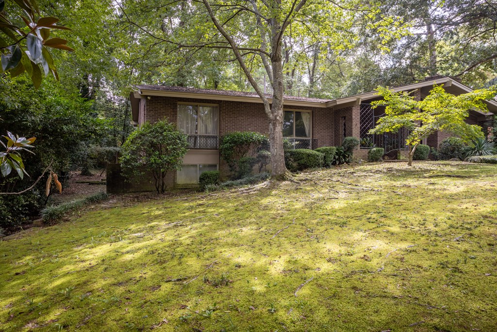 2724 Edgewood Road Columbus, GA 31906 - Photo 3 of 22 a view of a house with pool and garden