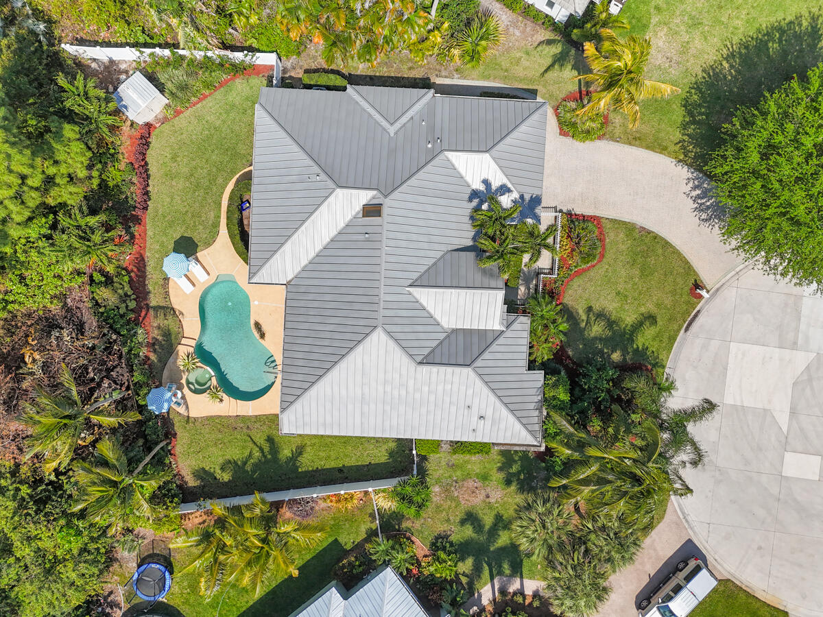 7831 Southeast Windjammer Way Hobe Sound, FL 33455 - Photo 3 of 80 DJI_20250314122603_0944_D