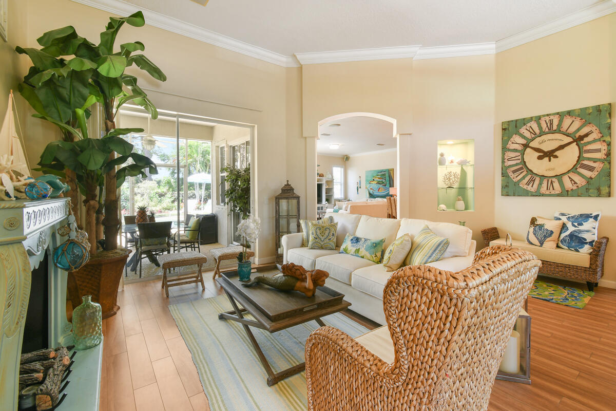 7831 Southeast Windjammer Way Hobe Sound, FL 33455 - Photo 8 of 80 a living room with furniture and a large window