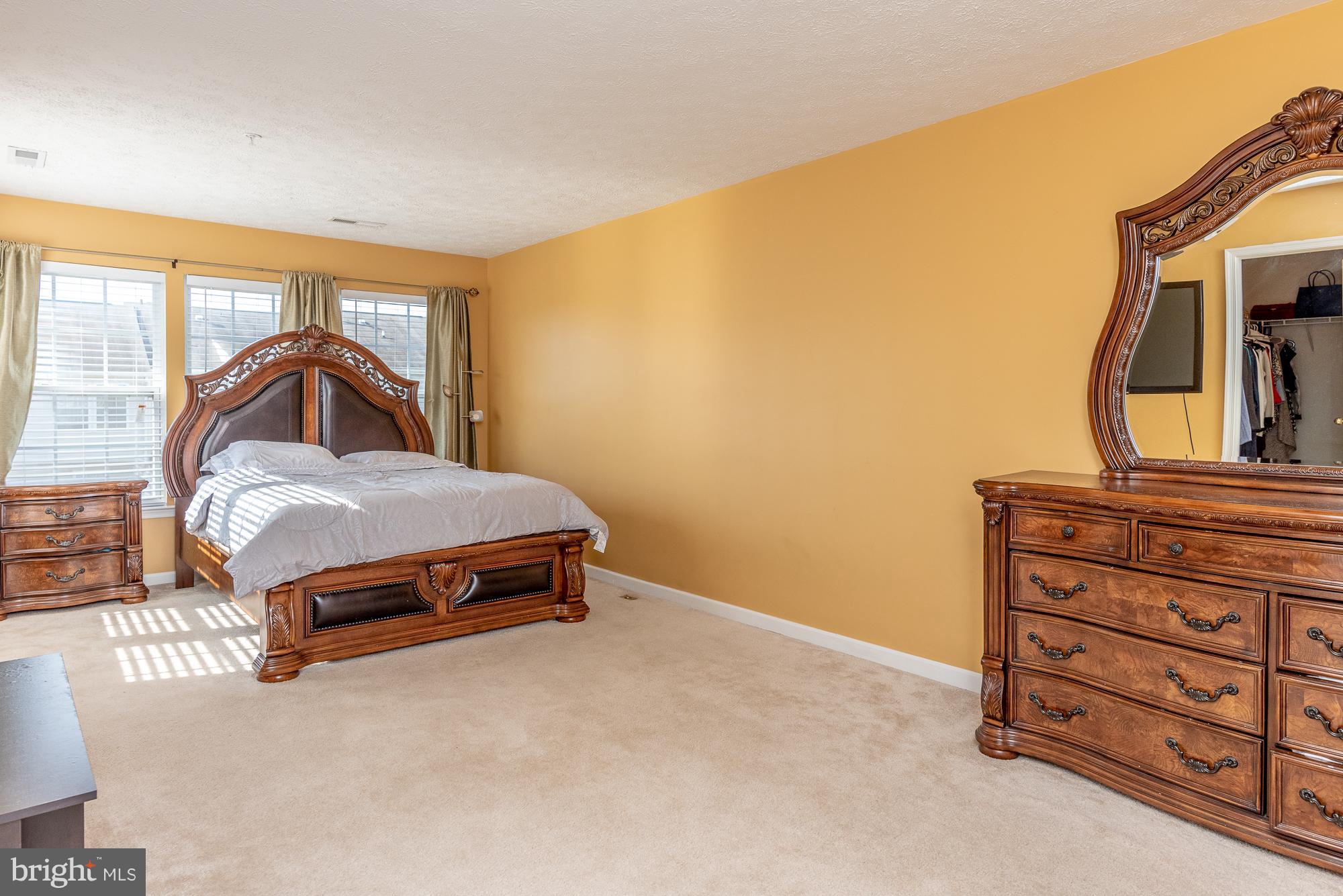 802 Tipton Road Middle River, MD 21220 - Photo 15 of 30 a bedroom with a bed and a dresser