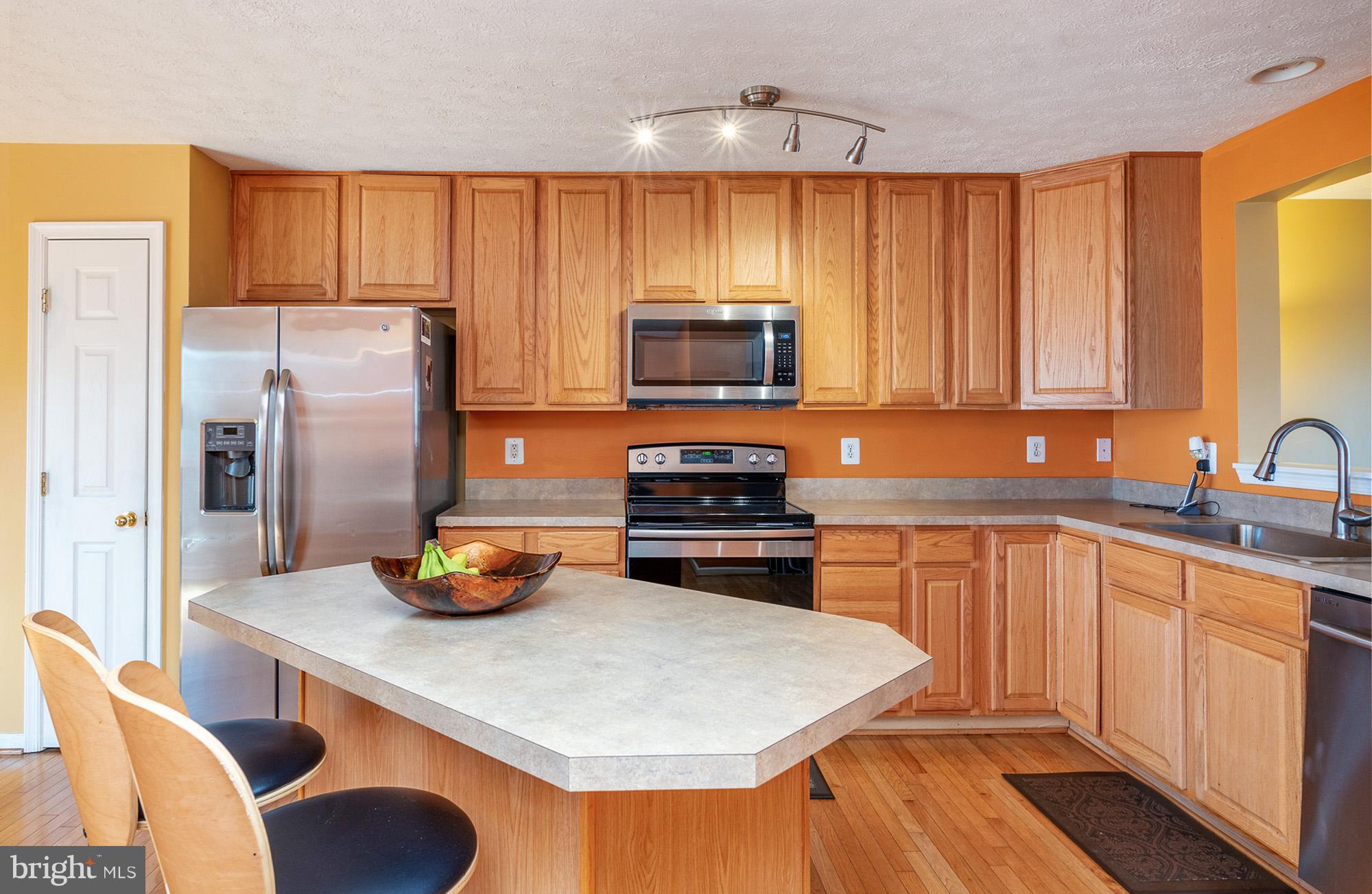802 Tipton Road Middle River, MD 21220 - Photo 6 of 30 a kitchen with a sink appliances and cabinets