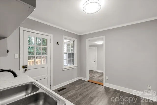 an empty room with windows