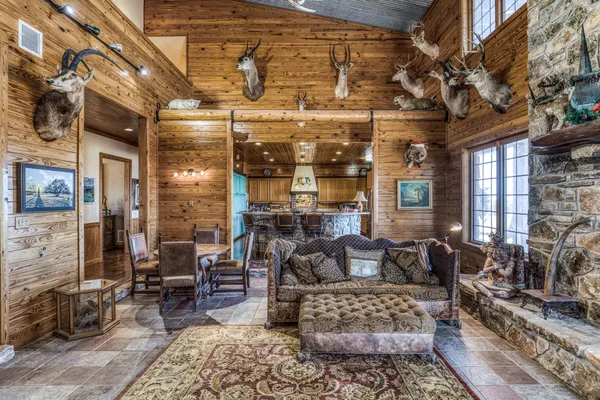 a kitchen with stainless steel appliances granite countertop a stove sink and cabinets