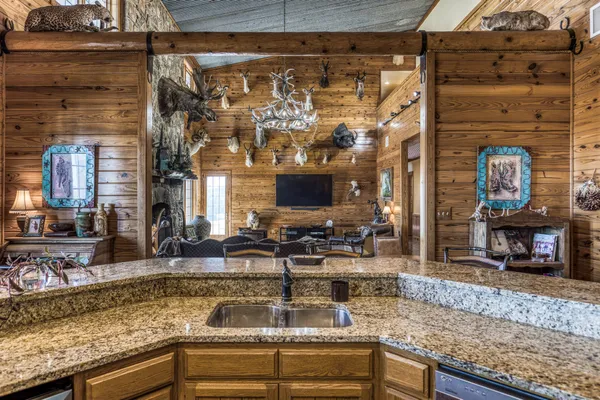 a kitchen with a stove and a refrigerator