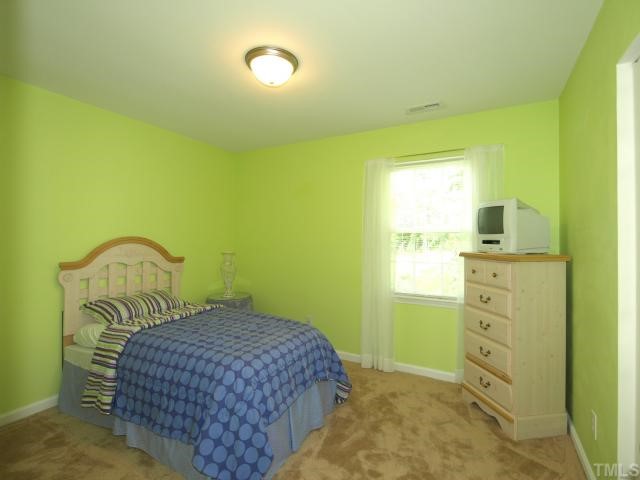 2886 Filbert Street Raleigh, NC 27610 - Photo 7 of 10 Bedroom # 2 is very large and has its own walk in closet.