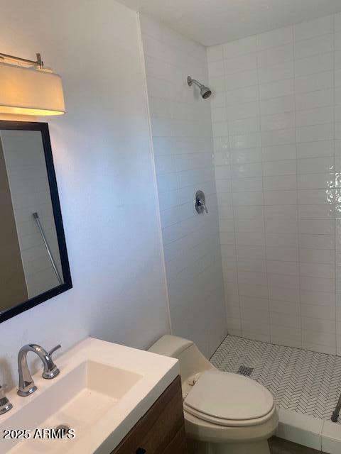 15 East Erie Drive Tempe, AZ 85282 - Photo 6 of 12 a bathroom with a sink a toilet and a mirror