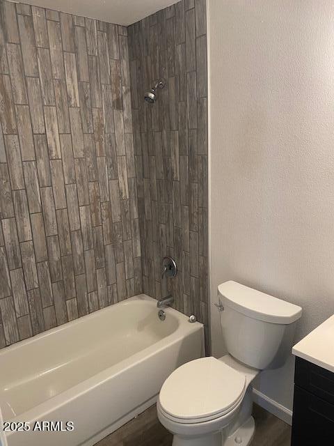 15 East Erie Drive Tempe, AZ 85282 - Photo 9 of 12 a white toilet and tub sitting next to a bathroom sink