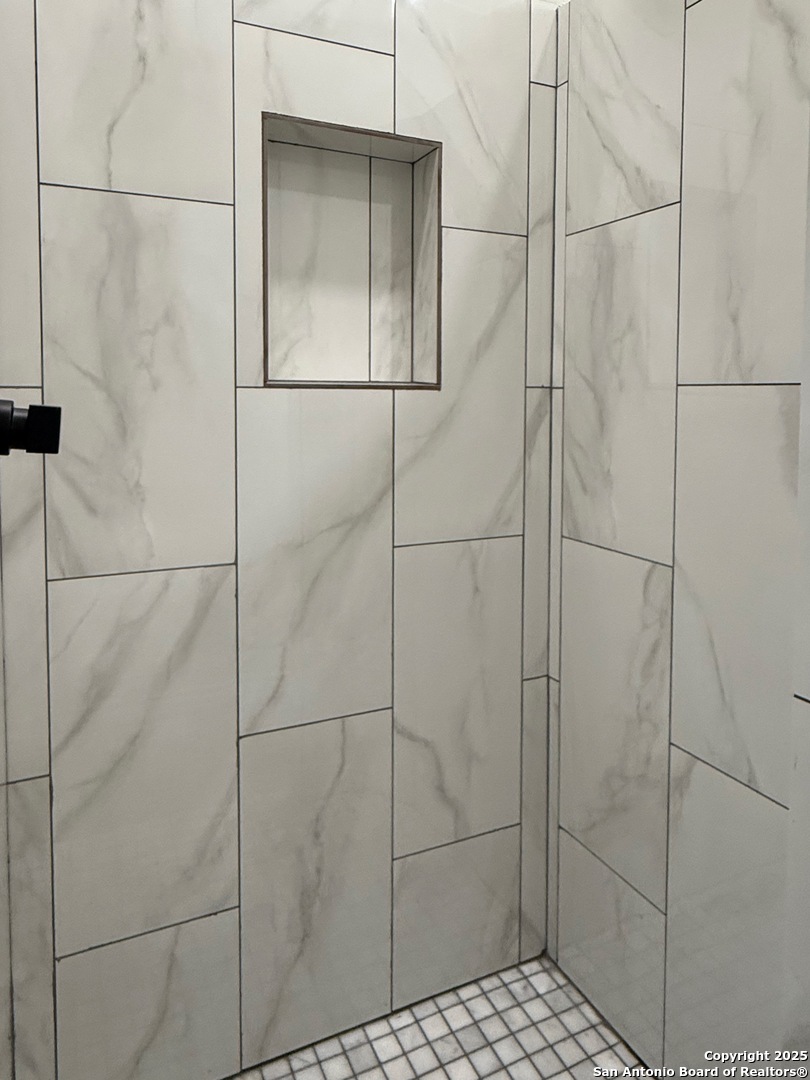 3274 Interstate 35 Natalia, TX 78059 - Photo 18 of 44 a bathroom with a shower