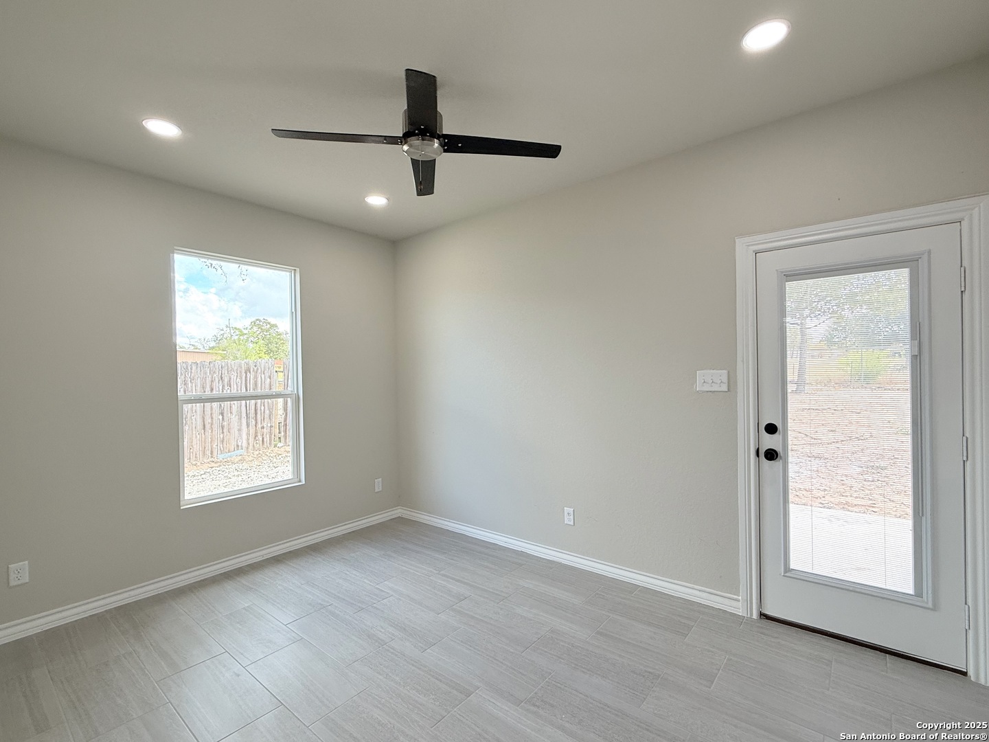 3274 Interstate 35 Natalia, TX 78059 - Photo 28 of 44 an empty room with windows and closet