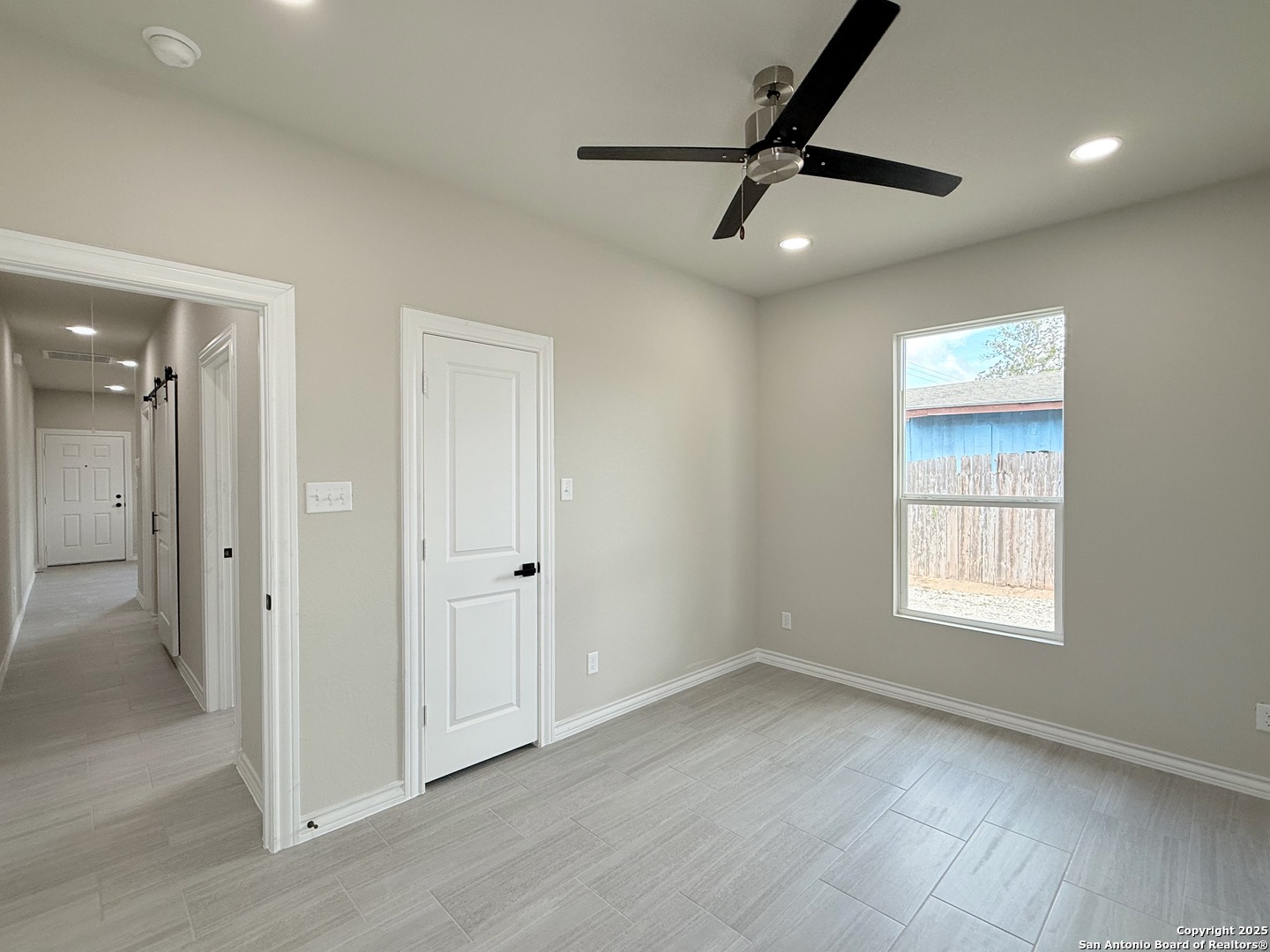 3274 Interstate 35 Natalia, TX 78059 - Photo 29 of 44 a view of an empty room and a window