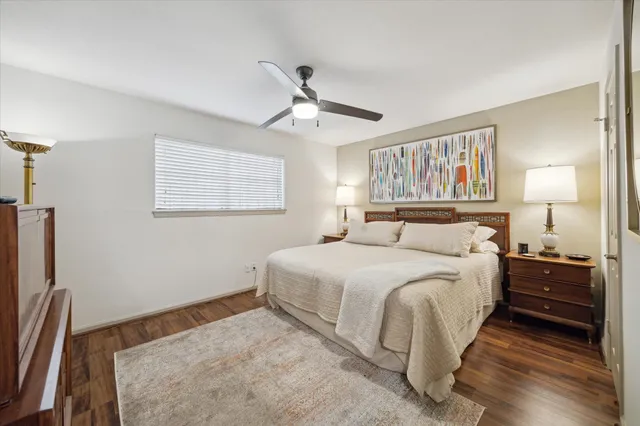 a bedroom with a bed and a walk in closet