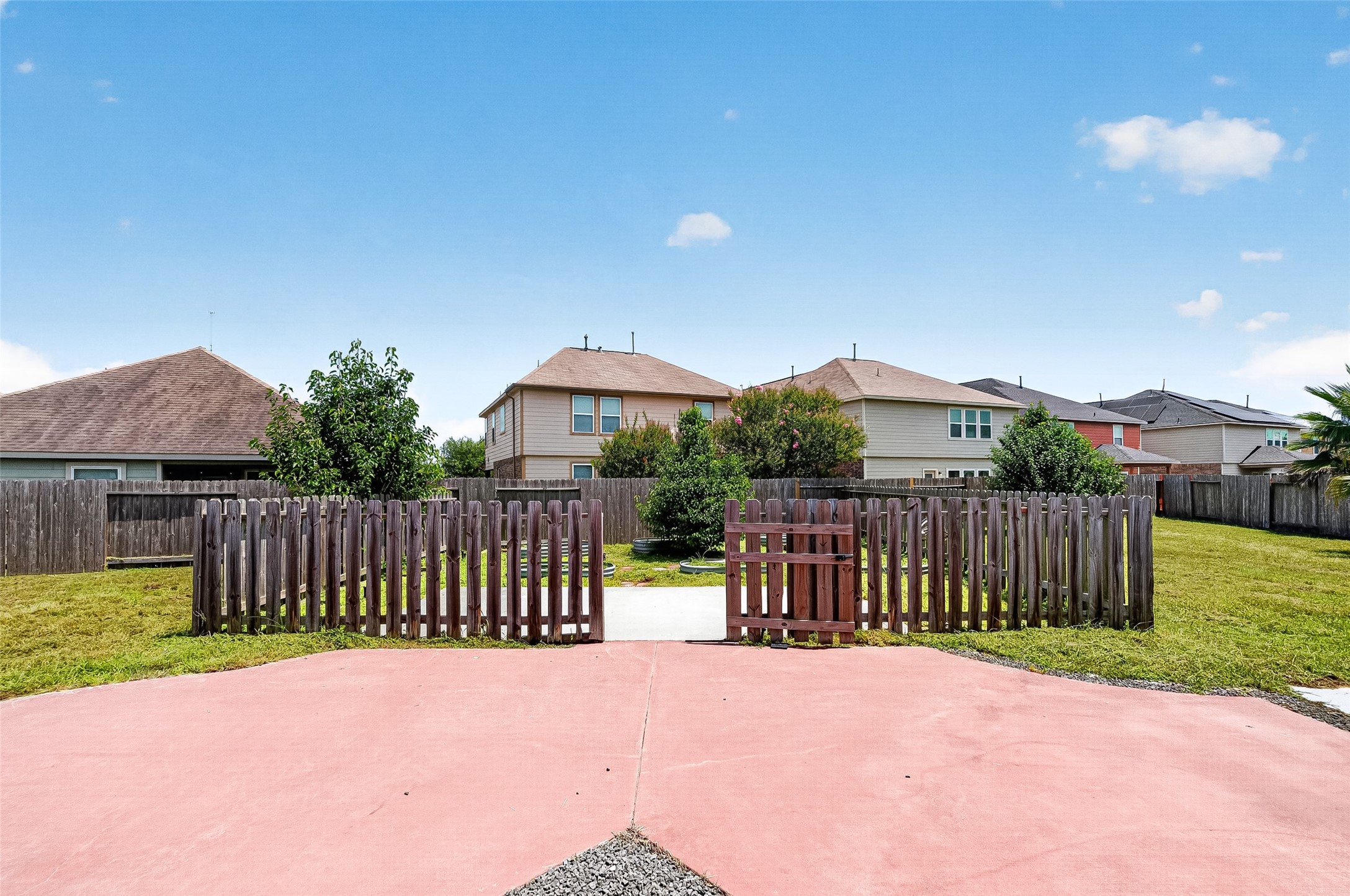 2702 Modano Court Fresno, TX 77545 - Photo 39 of 46 a view of a house with wooden fence