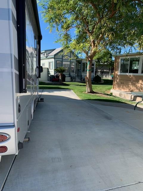 84136 Ave 44, Unit 92 Indio, CA 92203 - Photo 11 of 13 a view of a house with a swimming pool