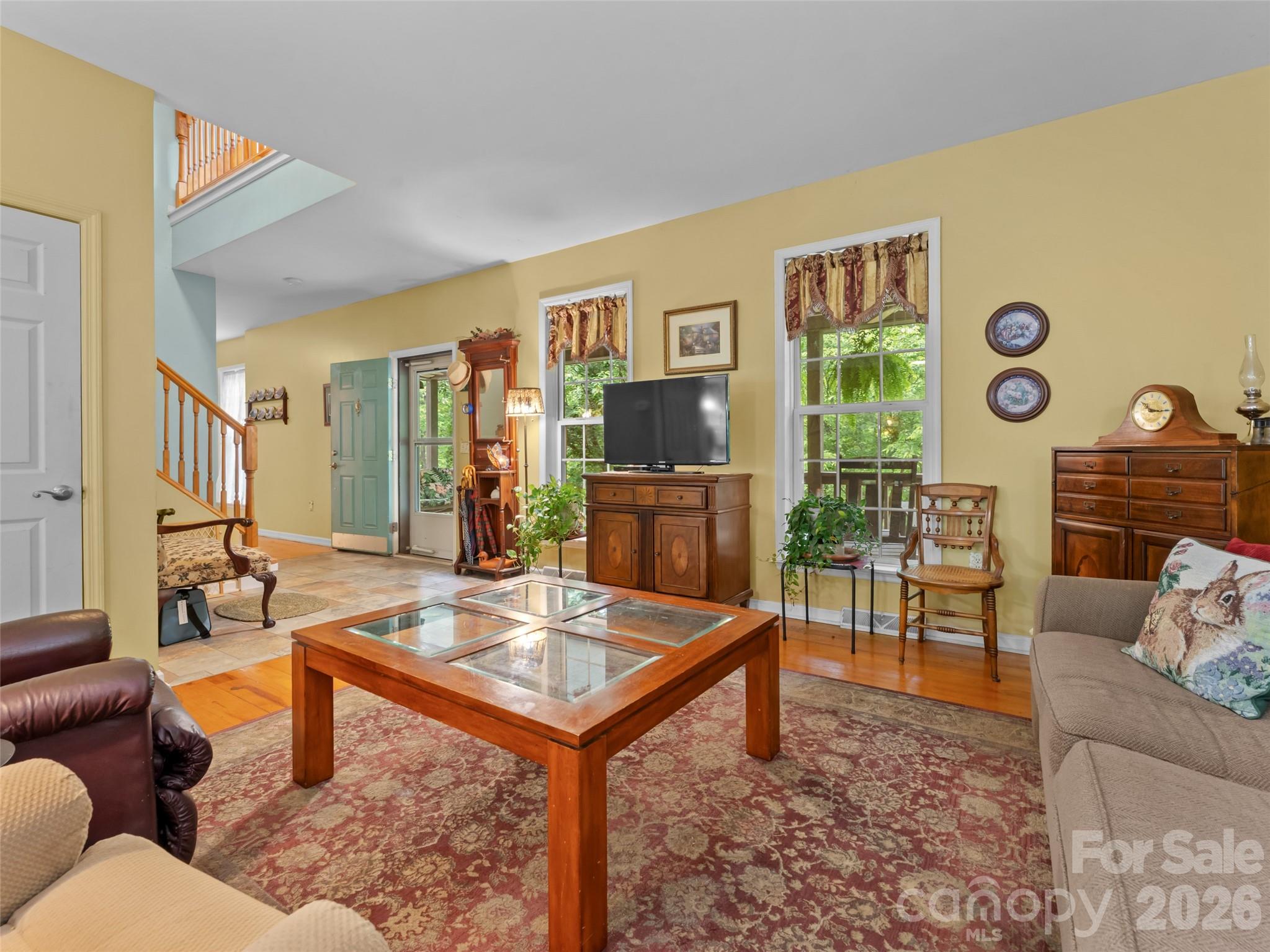 103 Old Southside Road Saluda, NC 28773 - Photo 13 of 48 a living room with furniture and a flat screen tv