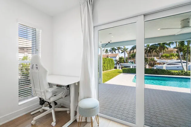 a bathroom with a shower and a sink
