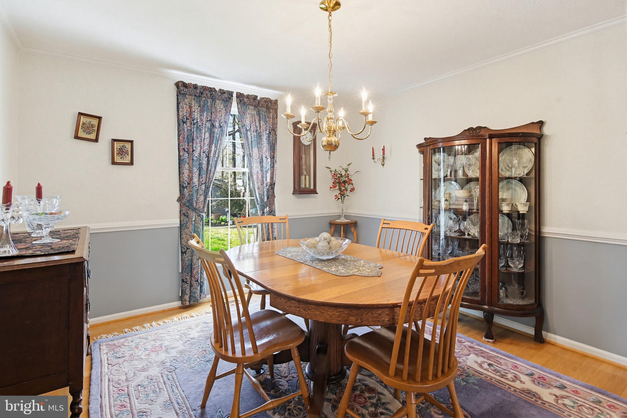 1017 Windmill Lane Silver Spring, MD 20905 - Photo 12 of 57 a view of a dining room with furniture window and wooden floor