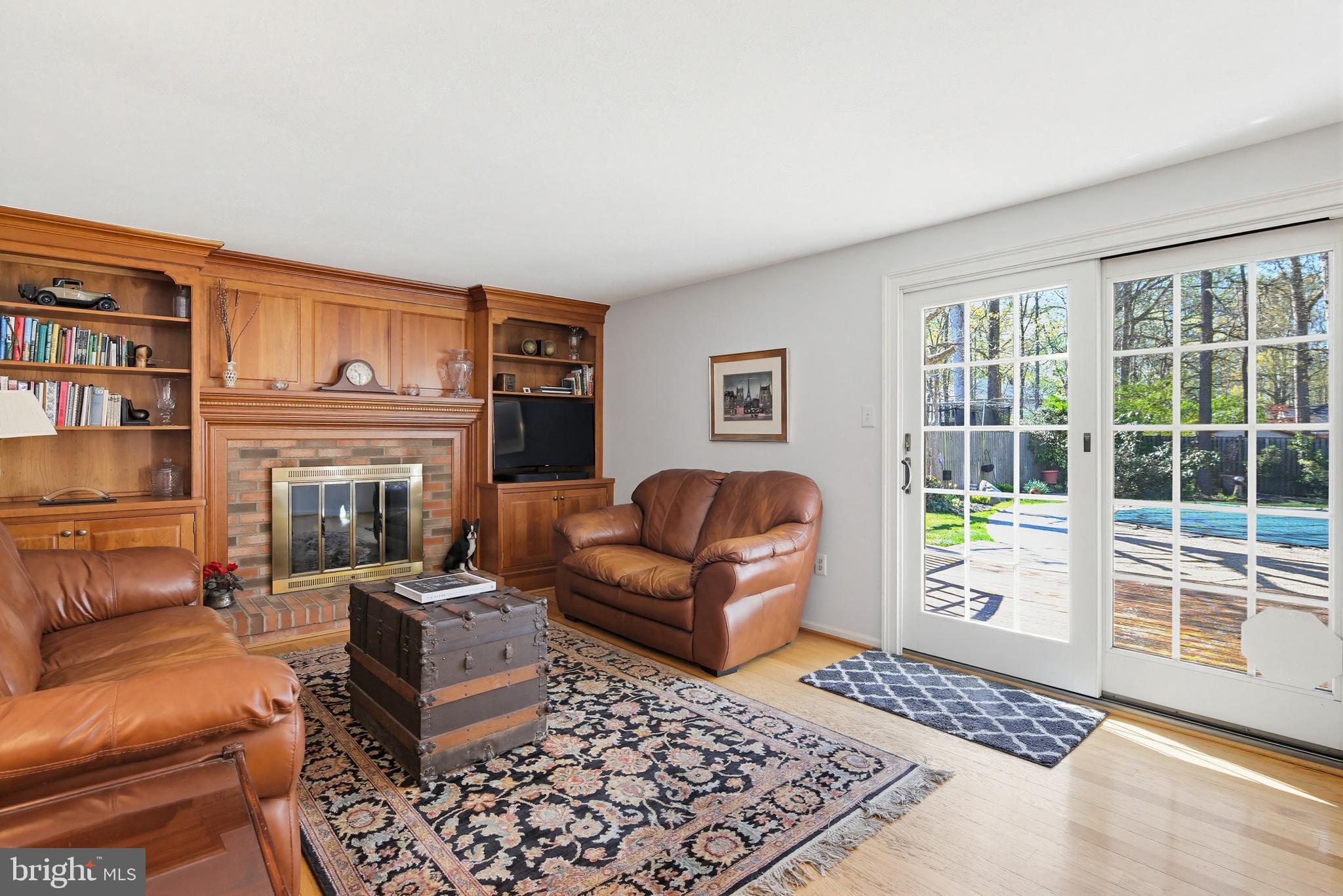 1017 Windmill Lane Silver Spring, MD 20905 - Photo 19 of 57 a living room with furniture and a fireplace