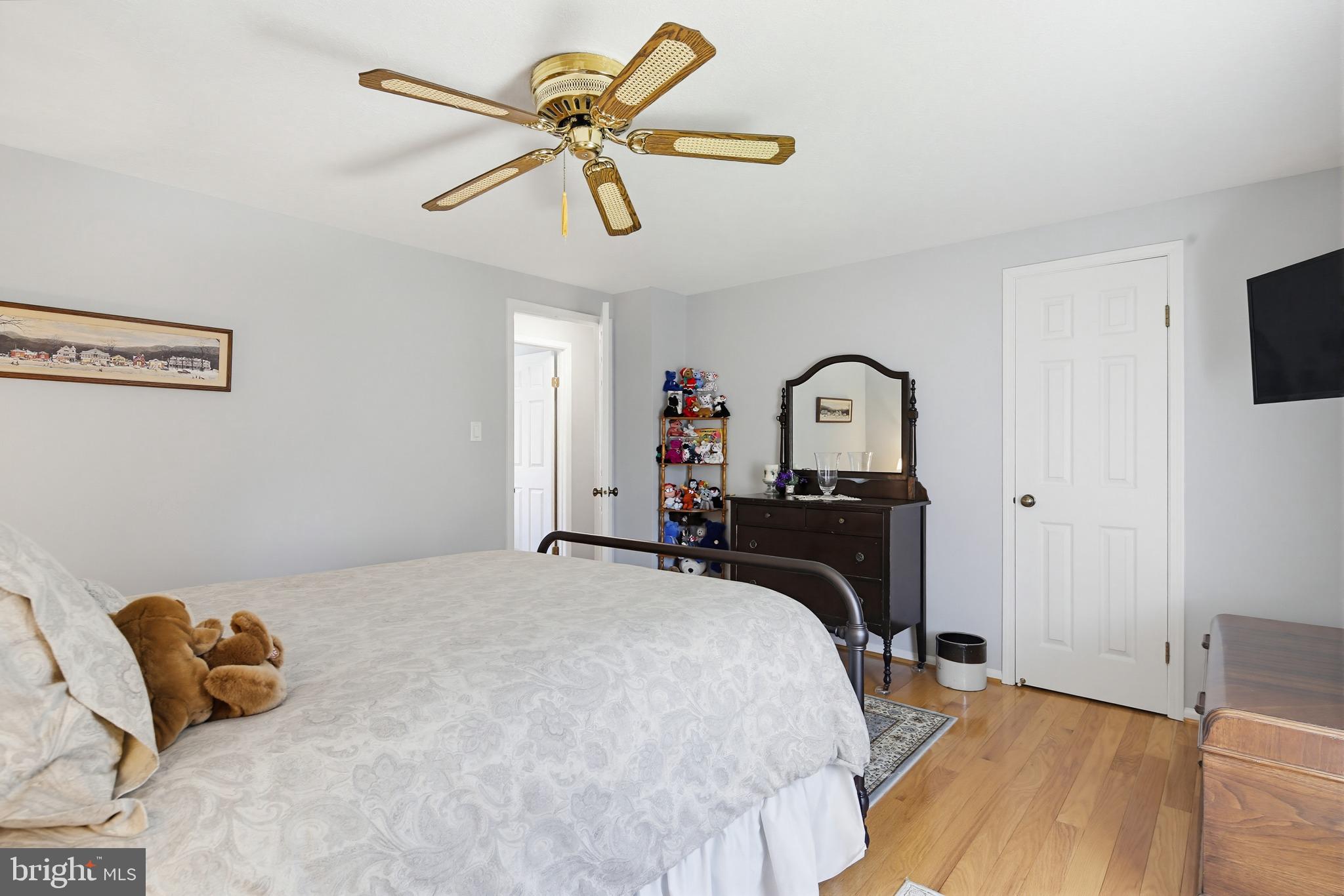 1017 Windmill Lane Silver Spring, MD 20905 - Photo 30 of 57 a bedroom with a bed and a tv