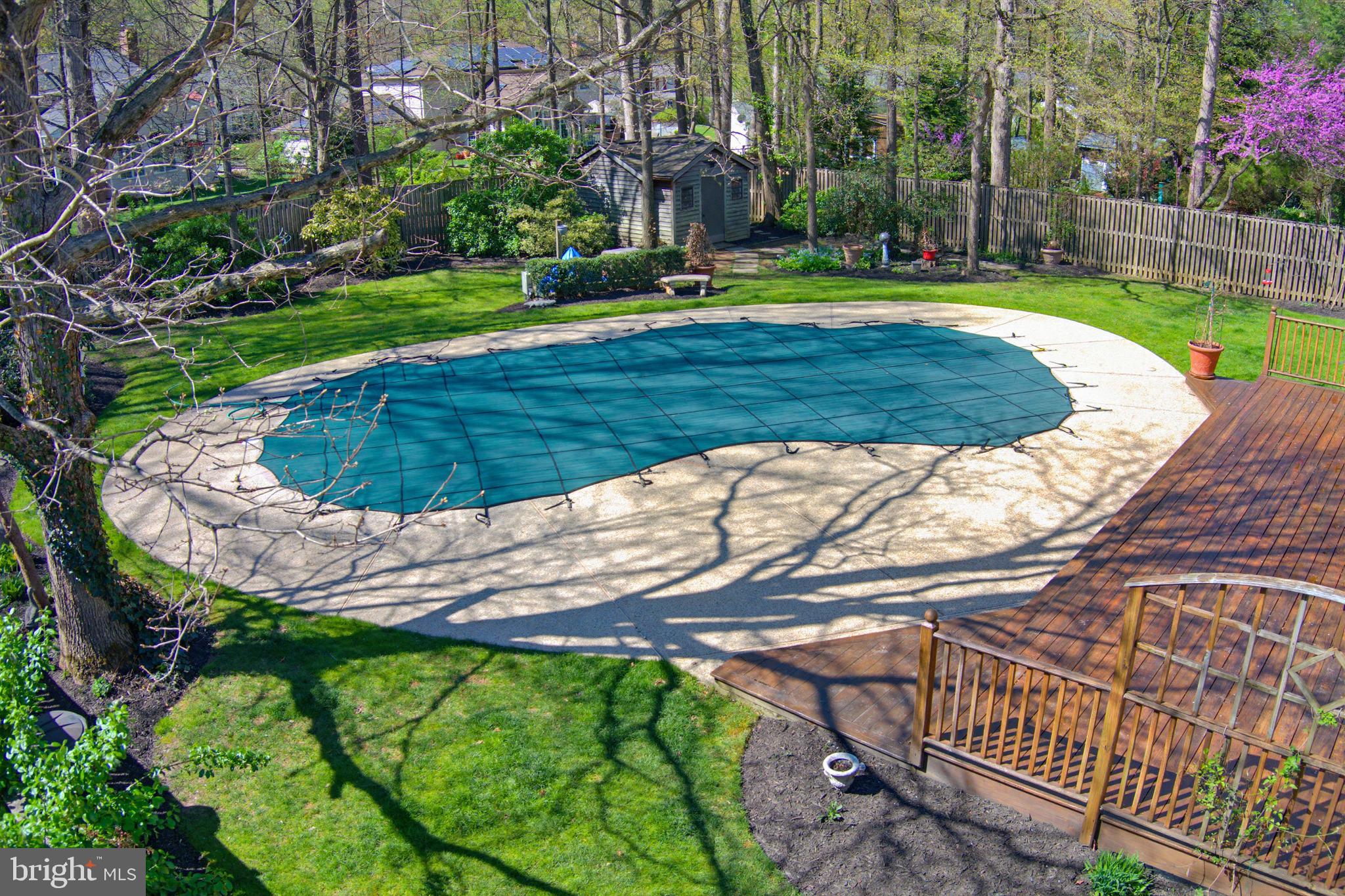 1017 Windmill Lane Silver Spring, MD 20905 - Photo 43 of 57 a view of a swimming pool with a garden