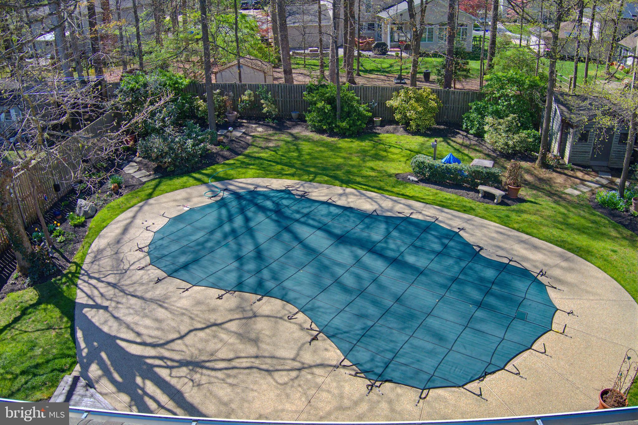 1017 Windmill Lane Silver Spring, MD 20905 - Photo 44 of 57 a view of a swimming pool with a yard
