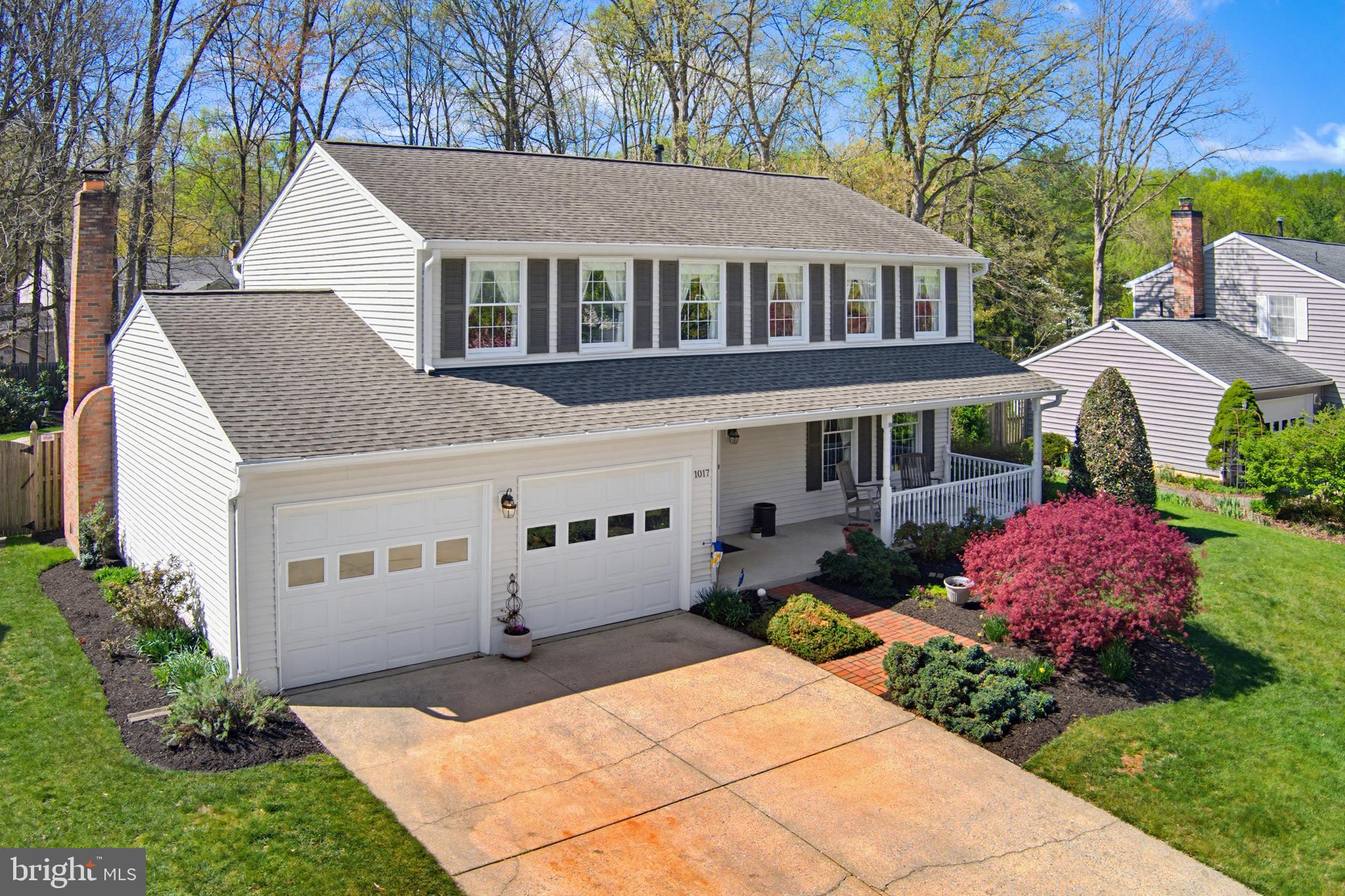 1017 Windmill Lane Silver Spring, MD 20905 - Photo 5 of 57 a front view of a house with garden