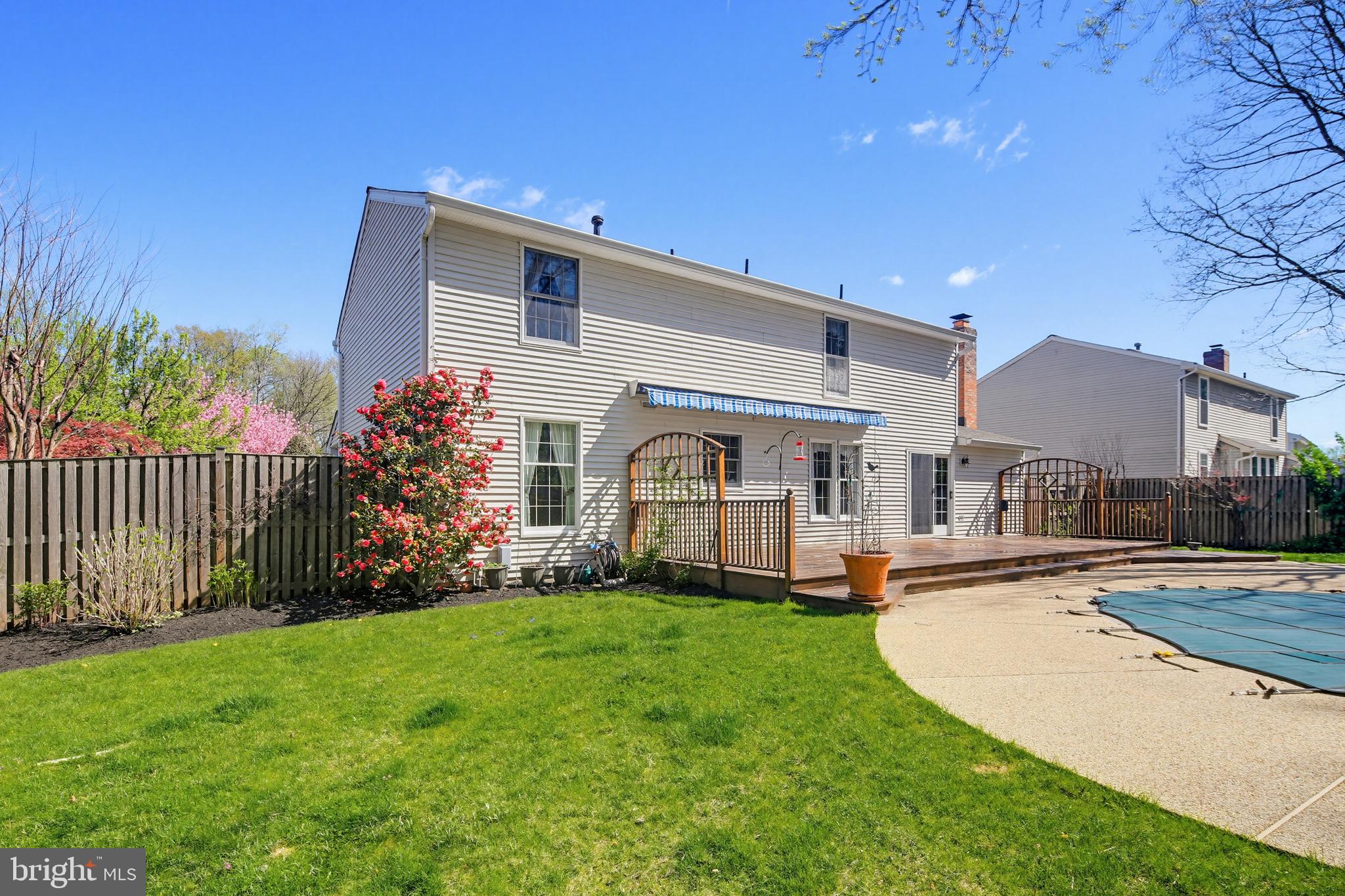 1017 Windmill Lane Silver Spring, MD 20905 - Photo 54 of 57 a front view of a house with a yard and porch