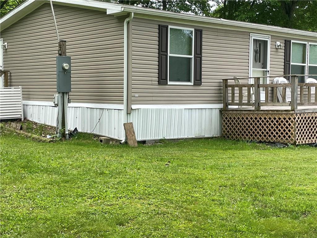 14624 Gilliland Road Linesville, PA 16424 - Photo 3 of 23 a front view of a house with a garden