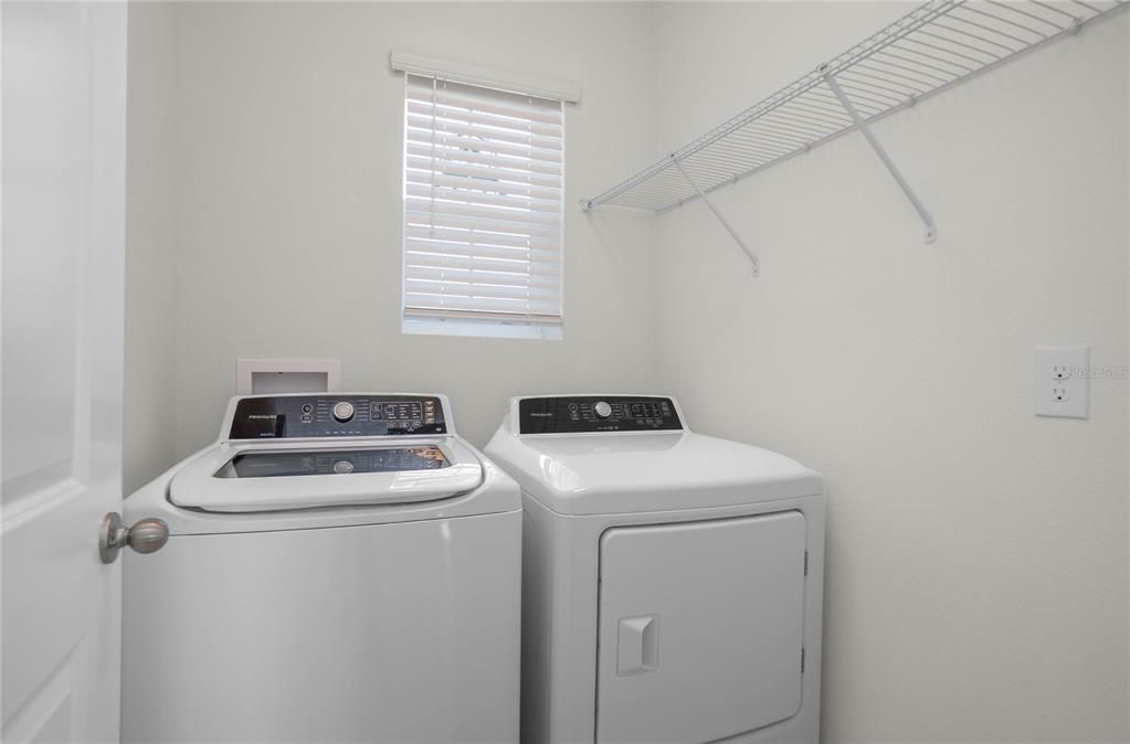 3525 North Burroughs Path Beverly Hills, FL 34465 - Photo 12 of 49 a utility room with dryer and washer