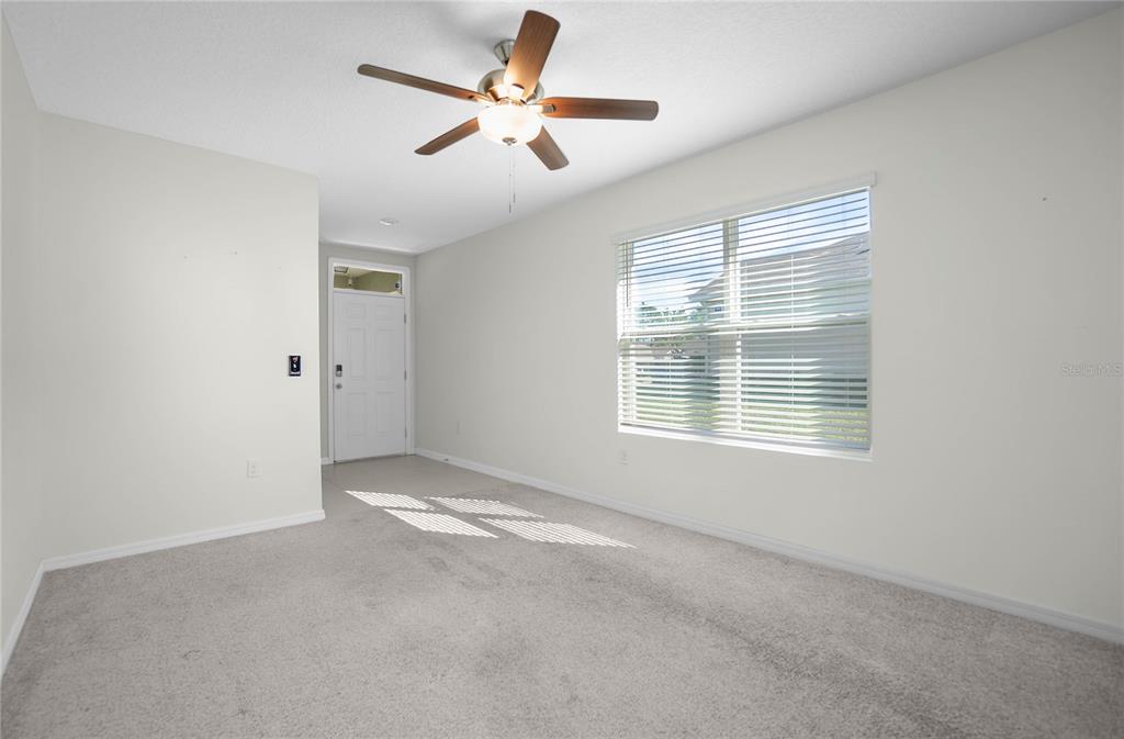 3525 North Burroughs Path Beverly Hills, FL 34465 - Photo 13 of 49 a view of an empty room with a window