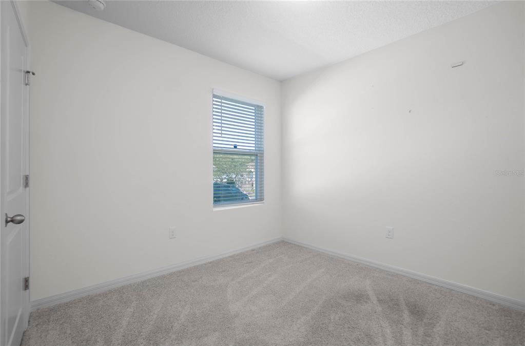 3525 North Burroughs Path Beverly Hills, FL 34465 - Photo 19 of 49 an empty room with a window