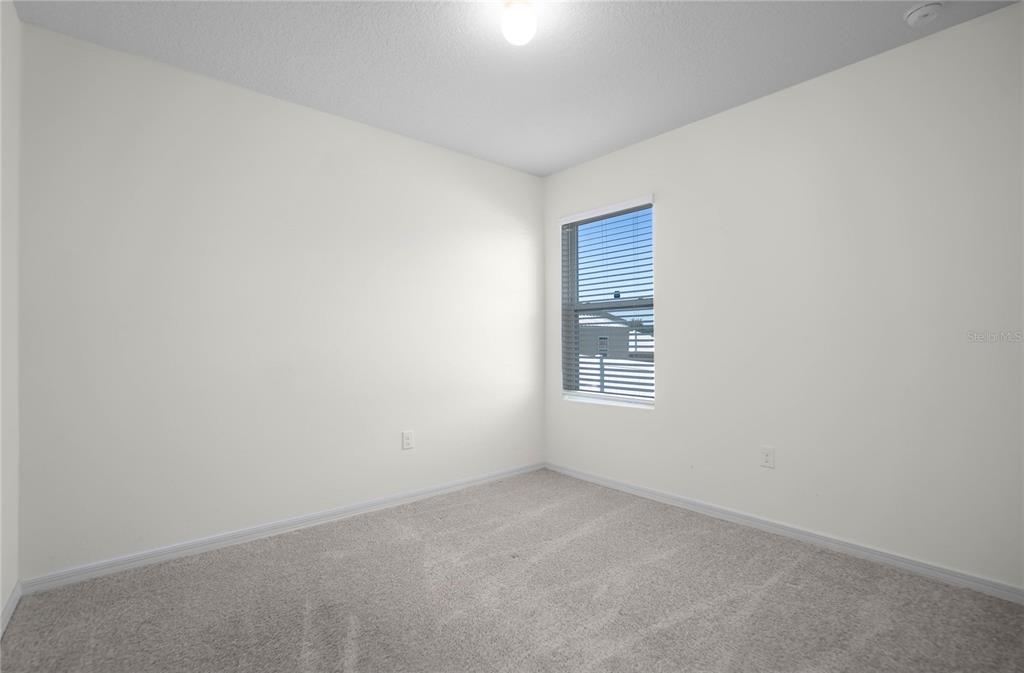 3525 North Burroughs Path Beverly Hills, FL 34465 - Photo 22 of 49 a view of an empty room with a window