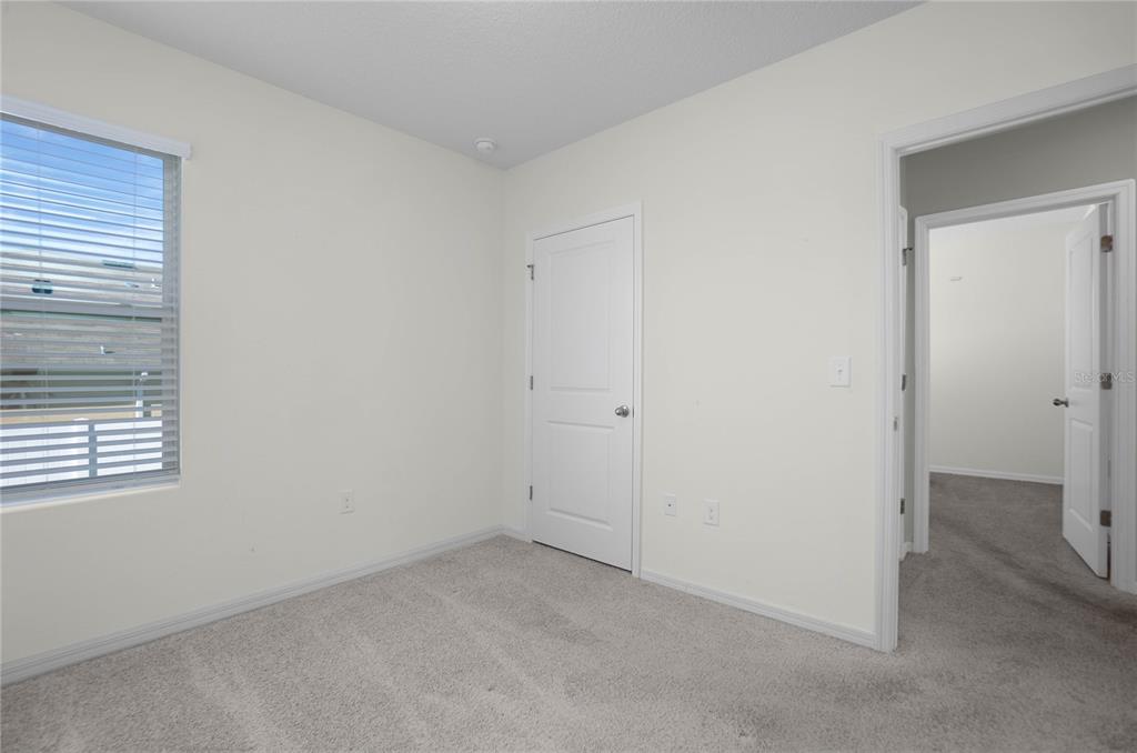 3525 North Burroughs Path Beverly Hills, FL 34465 - Photo 23 of 49 an empty room with windows