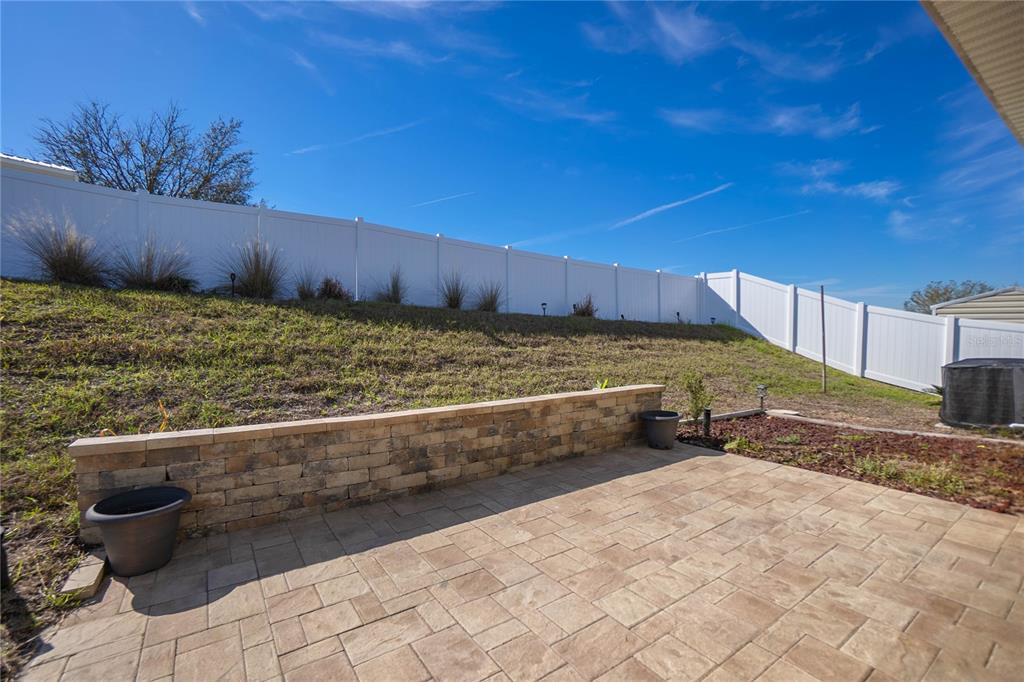 3525 North Burroughs Path Beverly Hills, FL 34465 - Photo 27 of 49 a view of a backyard with wooden fence