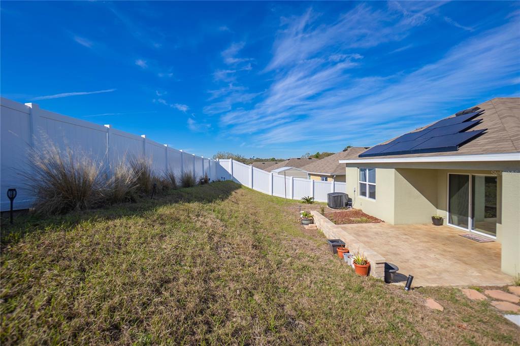 3525 North Burroughs Path Beverly Hills, FL 34465 - Photo 29 of 49 a view of a house with a yard