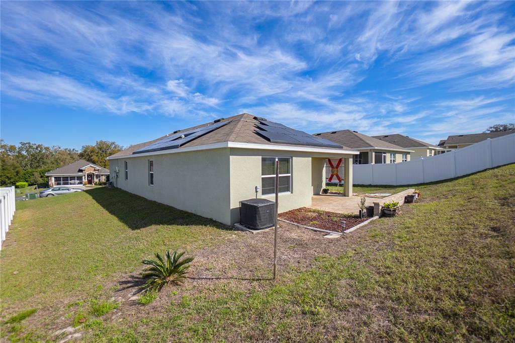 3525 North Burroughs Path Beverly Hills, FL 34465 - Photo 30 of 49 a front view of a house with garden
