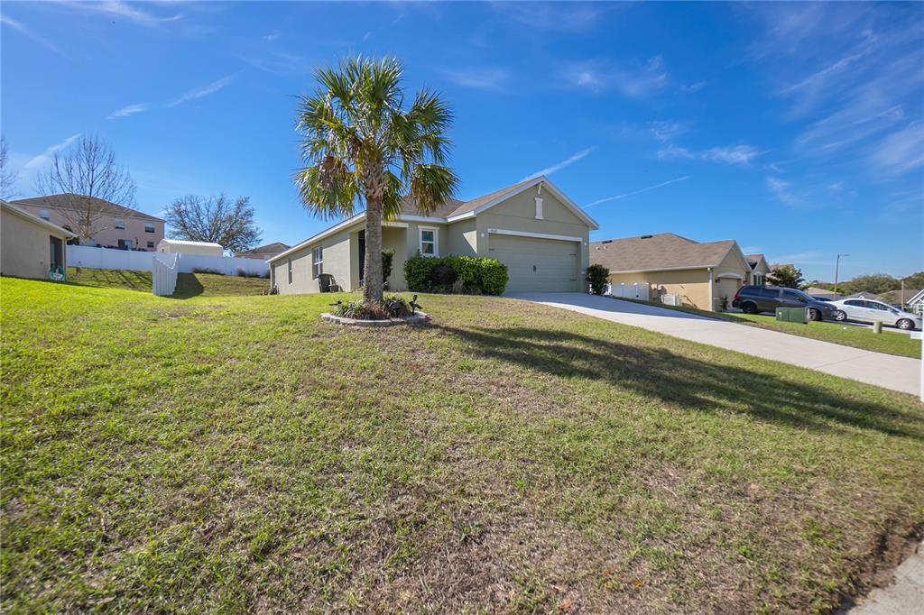 3525 North Burroughs Path Beverly Hills, FL 34465 - Photo 36 of 49 a front view of a house with a yard