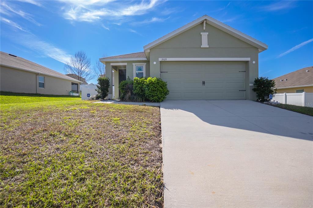 3525 North Burroughs Path Beverly Hills, FL 34465 - Photo 49 of 49 a front view of a house with a yard
