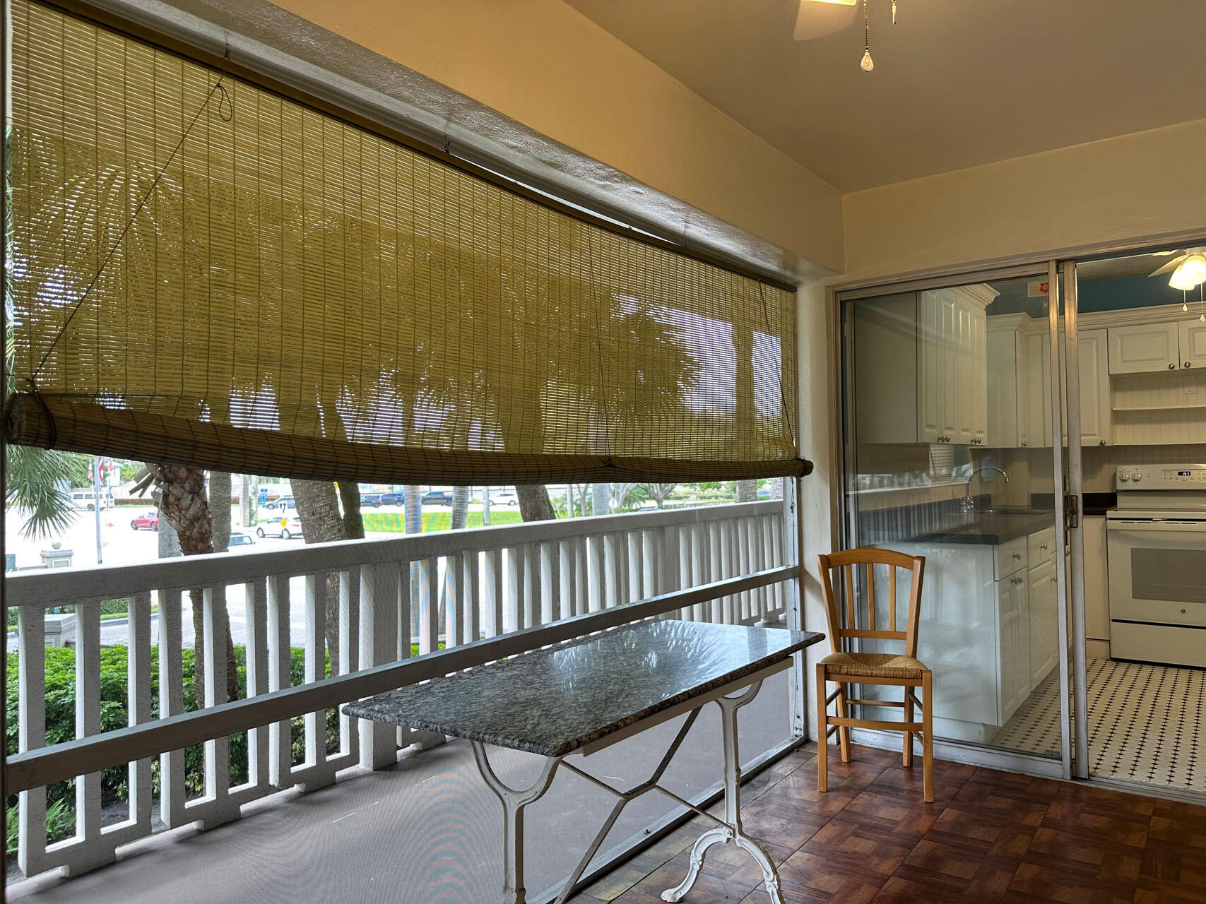 100 Royal Palm Way, Unit 2010 Boca Raton, FL 33432 - Photo 3 of 31 a view of a chairs and table in the balcony