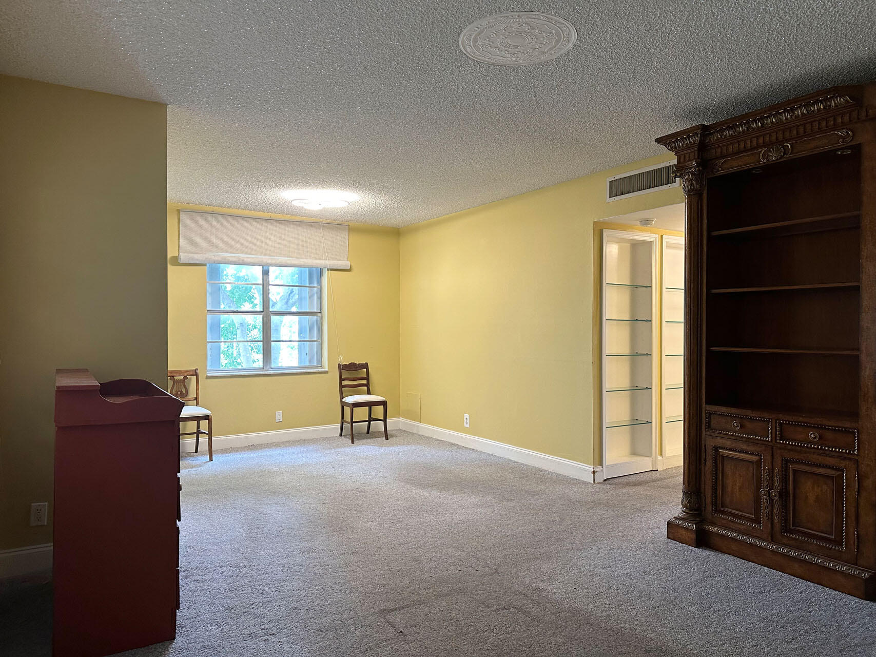 100 Royal Palm Way, Unit 2010 Boca Raton, FL 33432 - Photo 6 of 31 a view of an empty room with a window and a kitchen